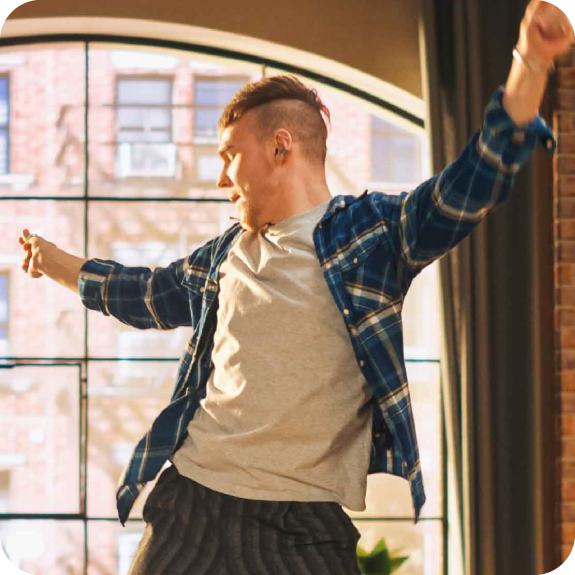 Man dancing by the window