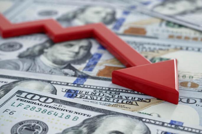 red-down-arrow-on-dollar-bills.jpg