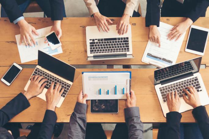 teamwork-collaboration-laptops-phones.jpg