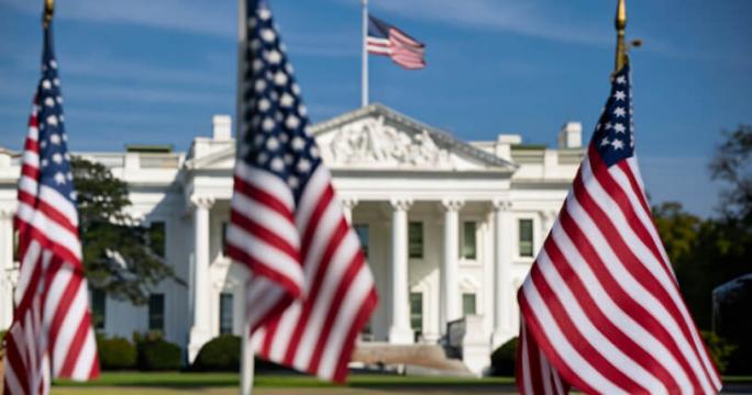 us-flags-with-white-house-in-the-background.jpg