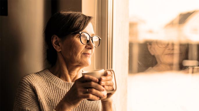 A woman enjoying her morning coffee