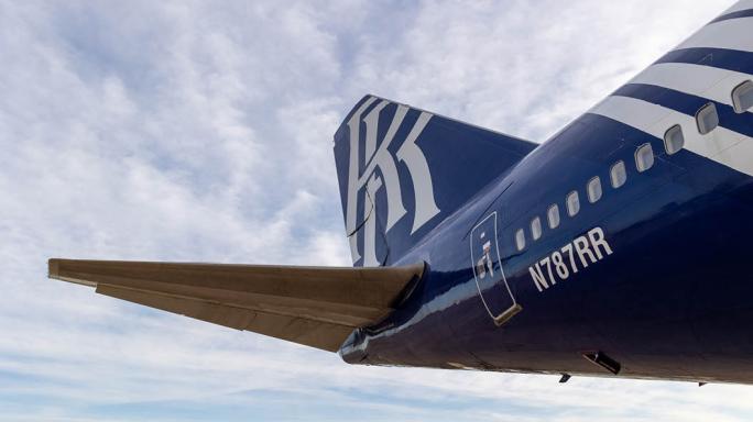 Large airplane mid flight in the air