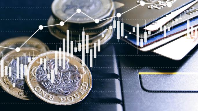 Stack of coins and charts