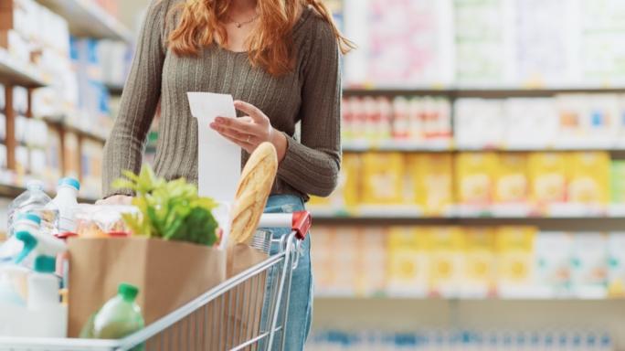 Customer checking the grocery receipt