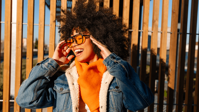 Young woman laughing in the sun