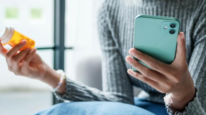 Lady holding medication