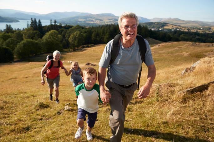 Man walking with grandchildren