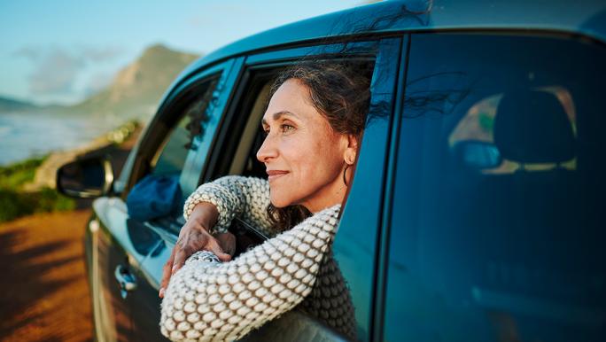 Woman gazing out of car window