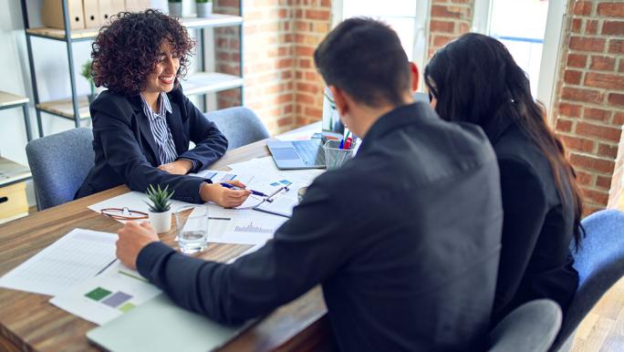 Mortgage advisor with clients