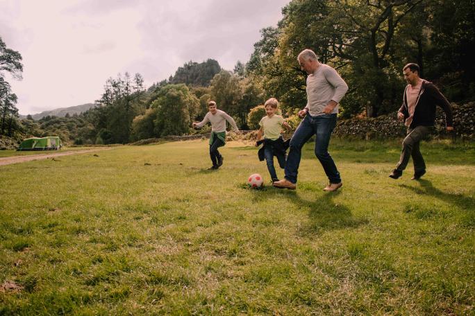 Family playing football