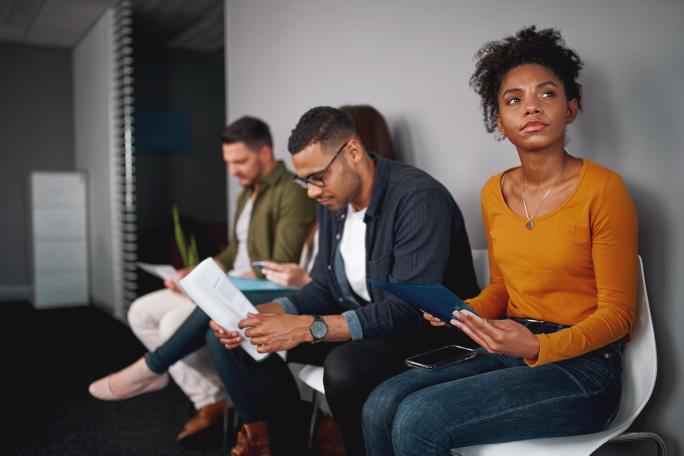 People in an interview queue