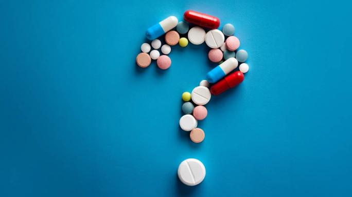 Question mark image of pharmaceutical pills