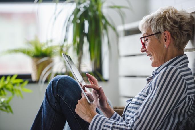 Senior woman using tablet