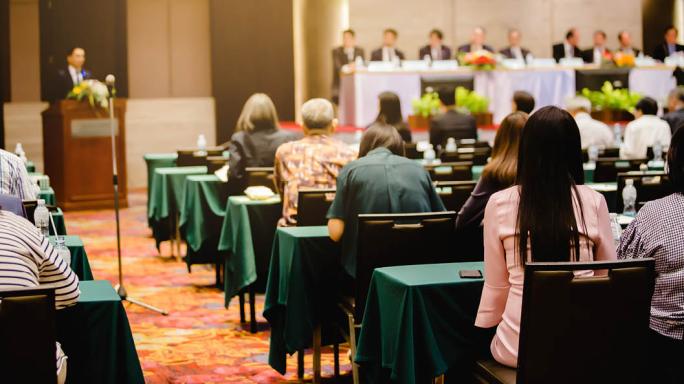 shareholders voting in a room
