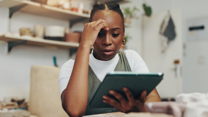 Woman looking at tablet