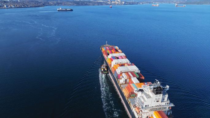 Container ship approaching shore