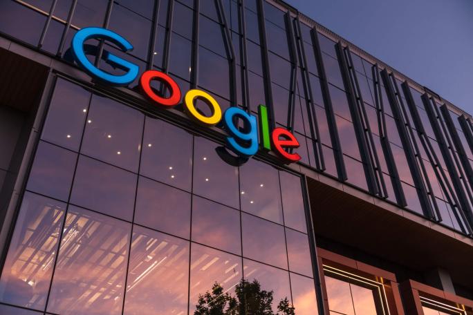 google logo on building at sunset