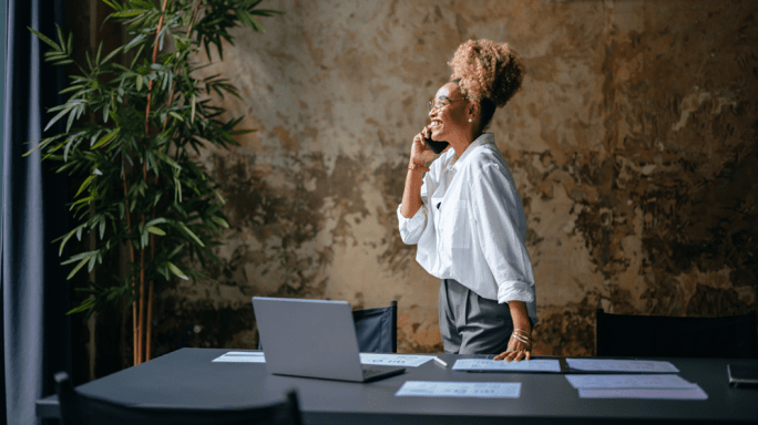 Happy investor on the phone