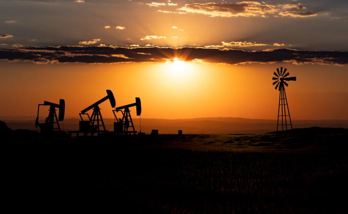 oil pumps at sunset