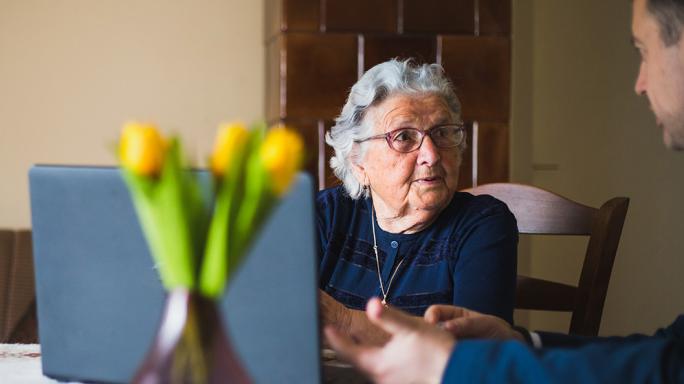 Old lady and professional in consultation