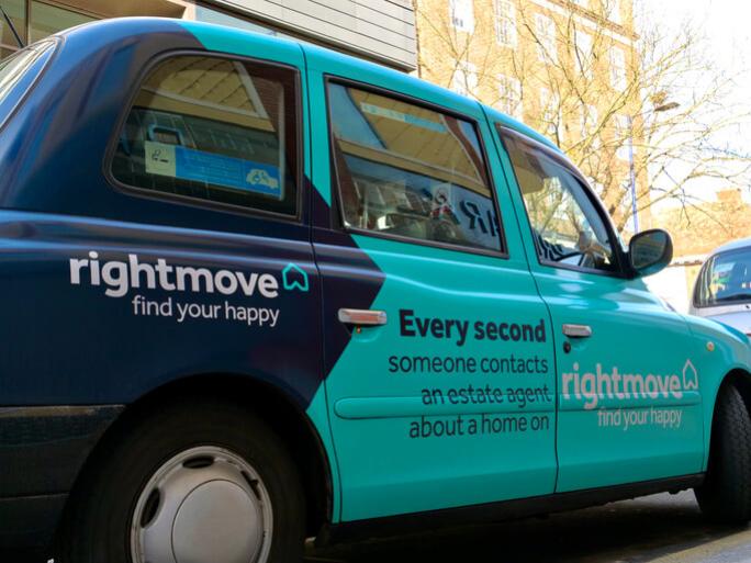 taxi with rightmove ads