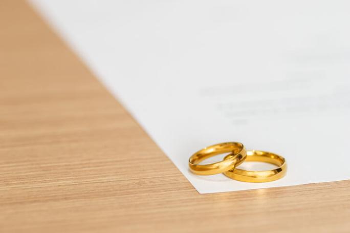 two gold rings on table