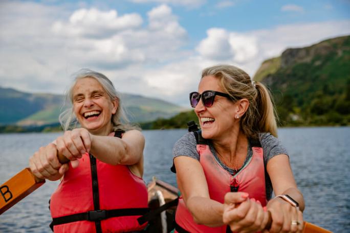 two women rowing