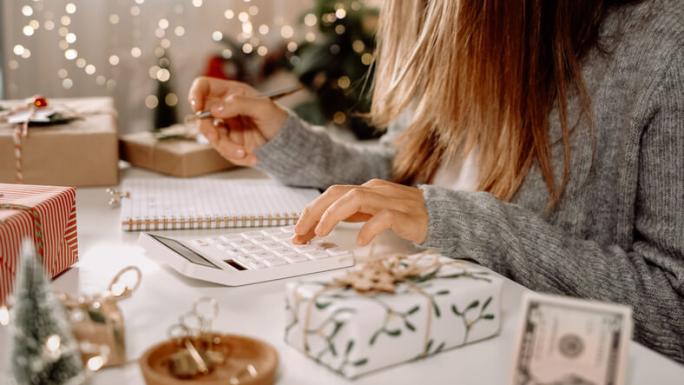 woman doing finances at christmas