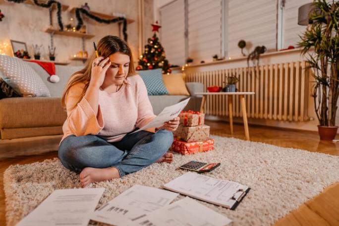 woman doing finances at christmas