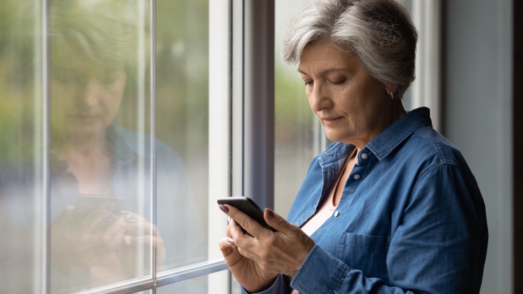 Lady looking at mobile