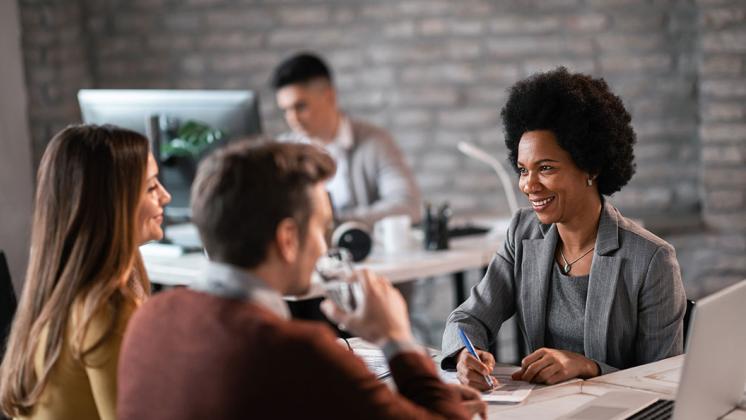 Advisor talking to clients