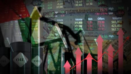 A chart with oil barrels in background