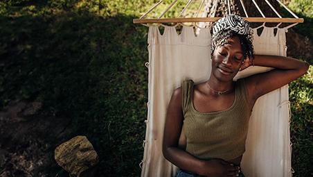 Women relaxing on a hammock