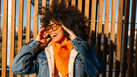 Young woman laughing in the sun