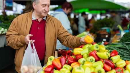 Man choosing apples