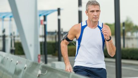Man running and looking determined