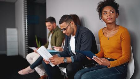 People in an interview queue