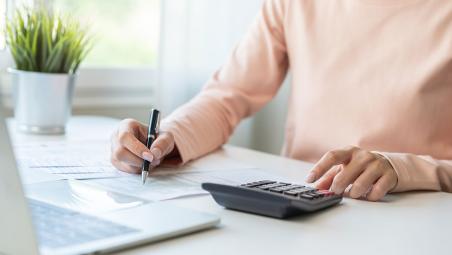 Woman with calculator