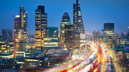 city of london at night with blurred lights
