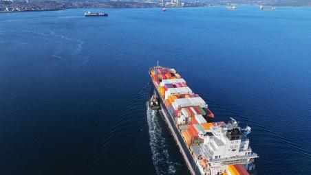 Container ship approaching shore
