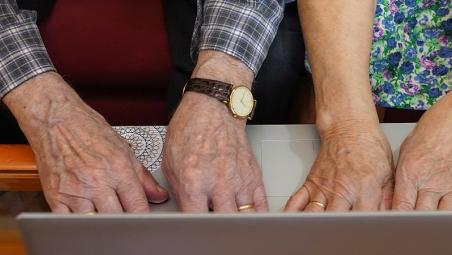 Elderly couple on laptop