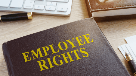 Employee rights handbook on a desk