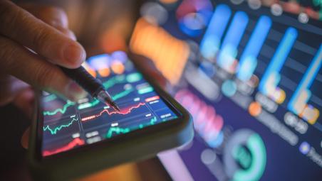 investment graphs on phone screen