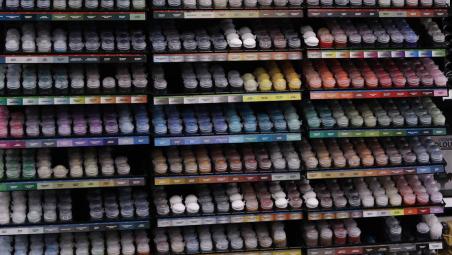 Paint pots on a shelf