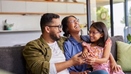 parents laughing with child