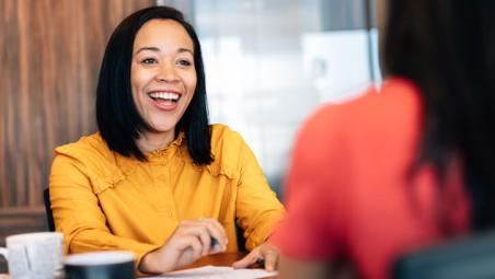 smiling business woman meeting with manager