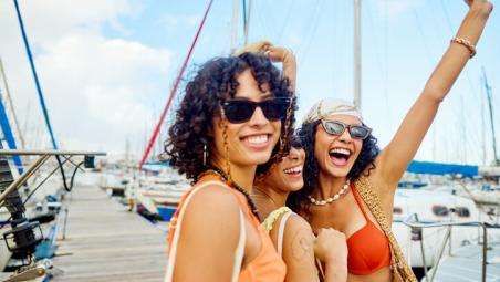 three friends out on a sailing adventure