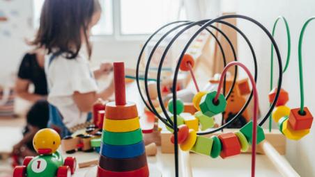 toddler playing with educational toys