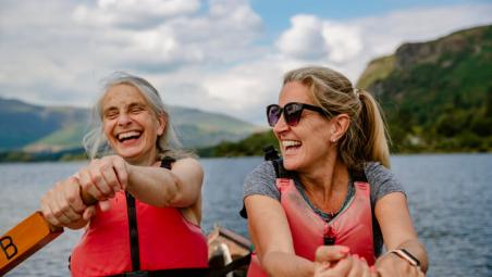 two women rowing