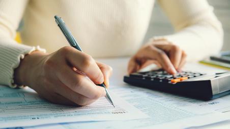 Woman with calculator